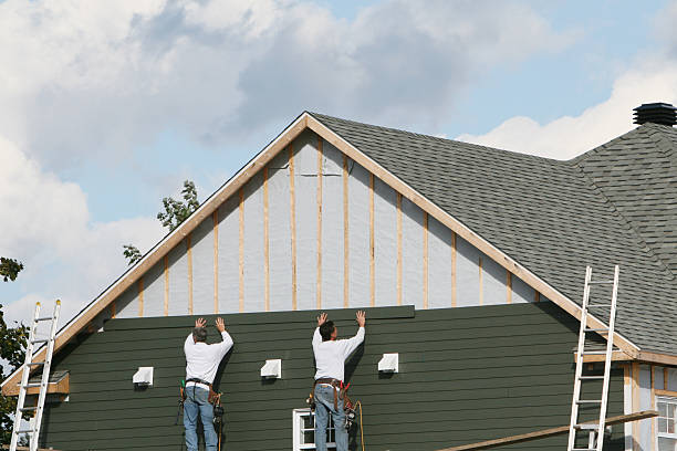 Professional Siding Contractor technician working in East Sparta, OH
